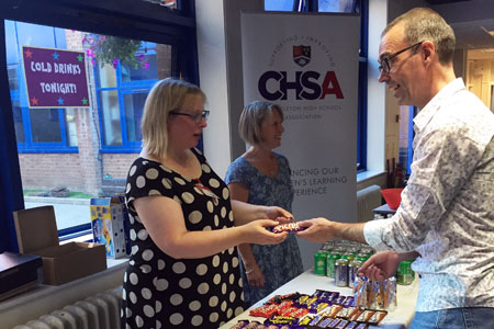 CHSA volunteer serving refreshments